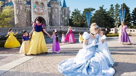Costumed characters with young children at Disneyland