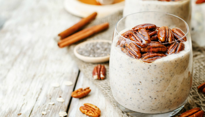 Glasses of chia pudding with pecans