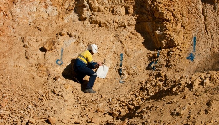 A geologist sampling rocks