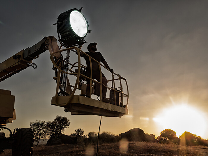 Gaffer career worker lifting machine for film industry