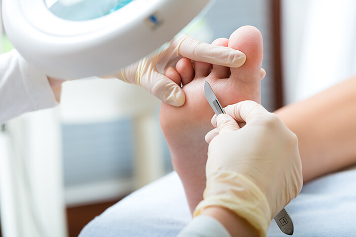 Podiatrist working on a client