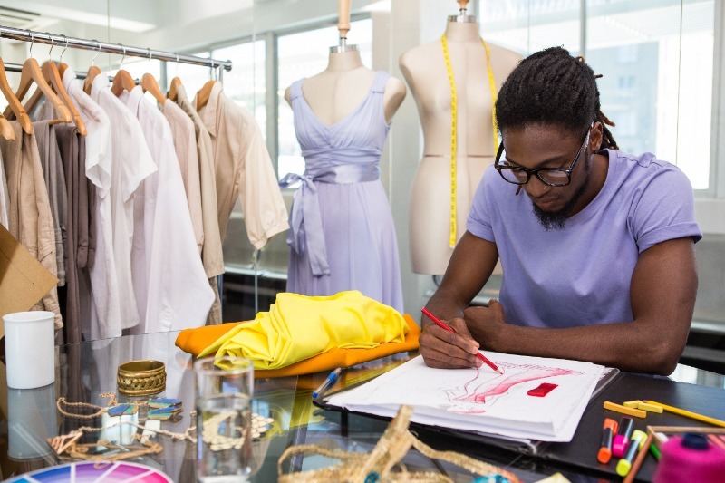 Fashion designer sketching a dress