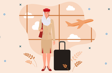 Happy Emirates cabin crew assistant with baggage and plane