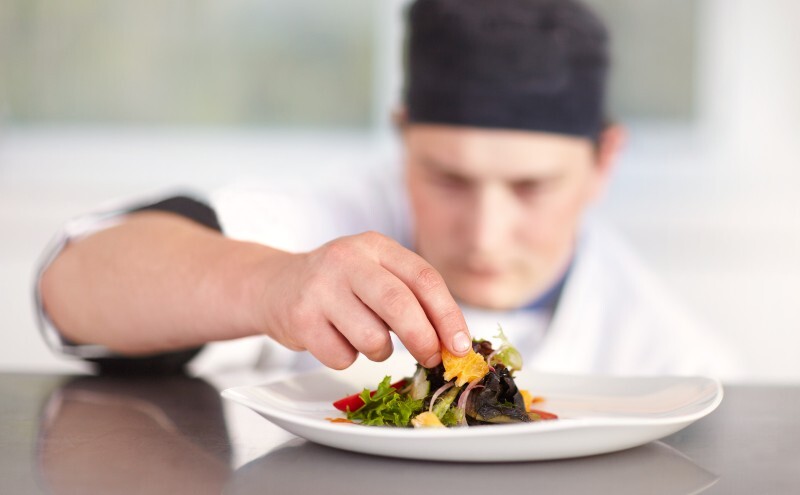 chef worker trying to achieve perfection